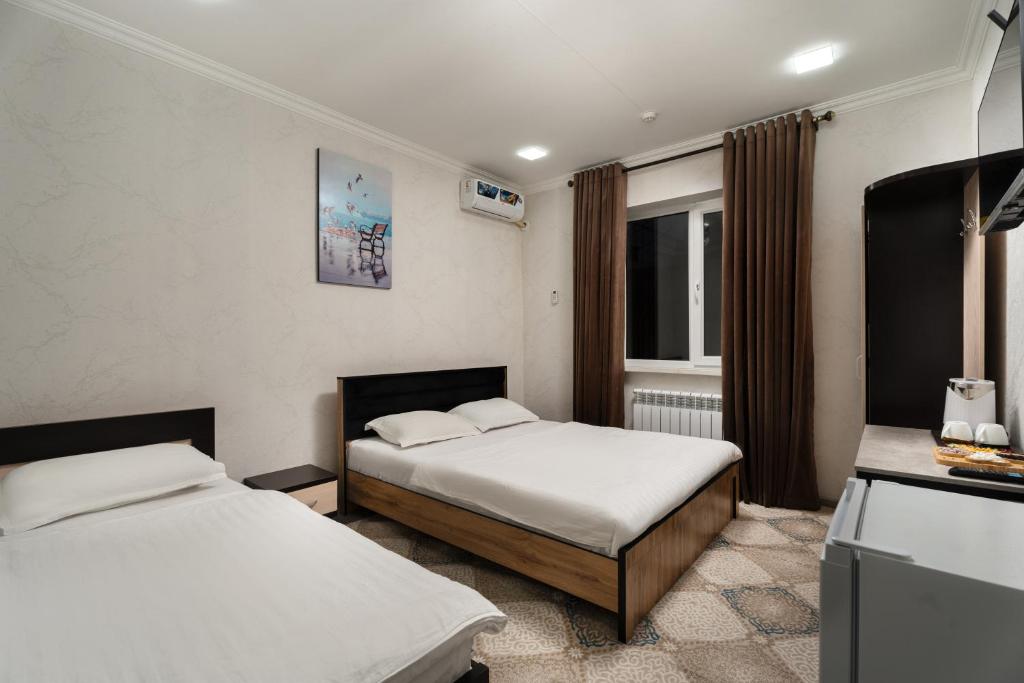 Katil atau katil-katil dalam bilik di AL-SAID Hotel