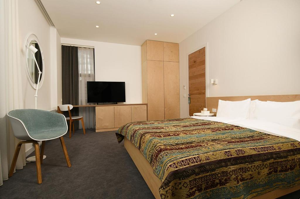 TV a/nebo společenská místnost v ubytování Dilijani Tun Hotel & Restaurant