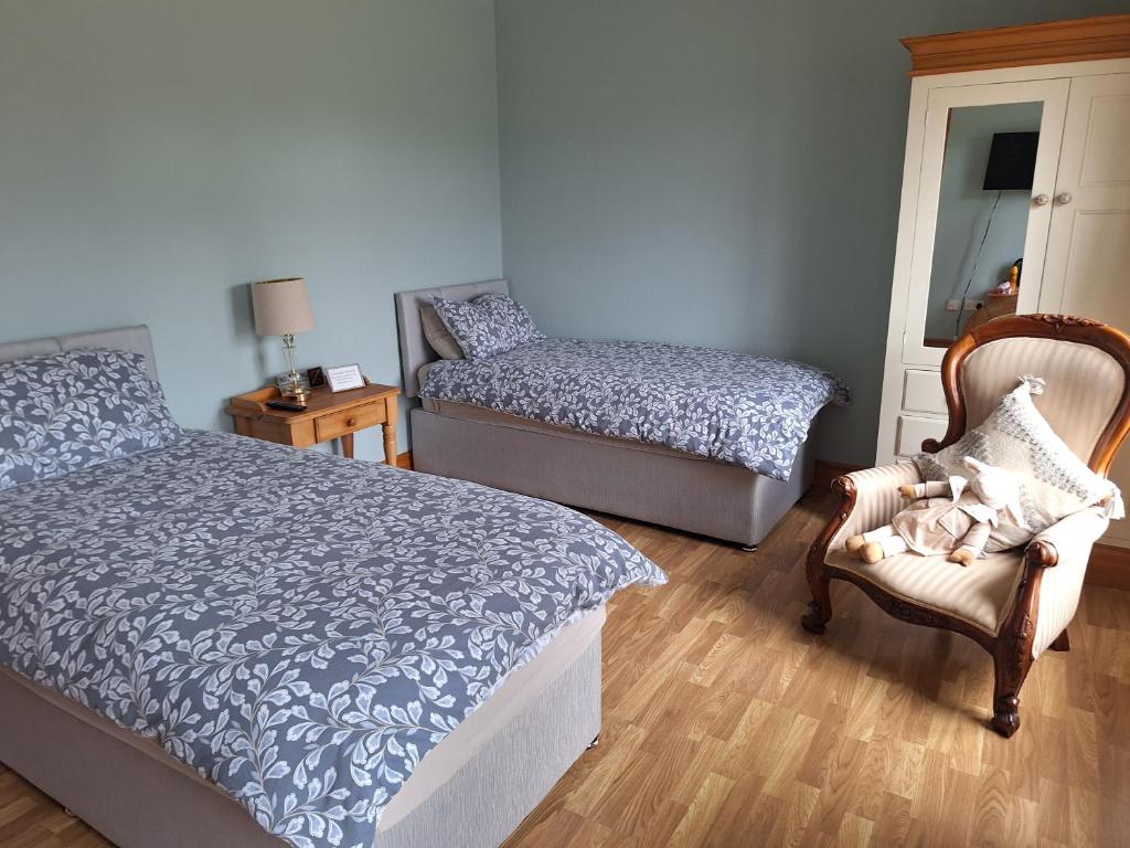 Postel nebo postele na pokoji v ubytování Ballnamona house