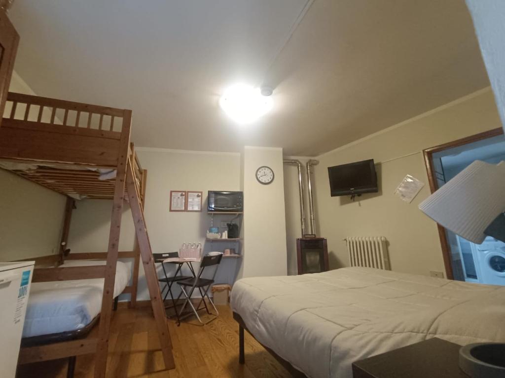 A bed or beds in a room at B&B LA MARMOTTA