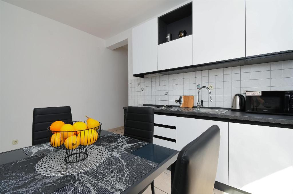 Kuchyňa alebo kuchynka v ubytovaní Apartment Biserka