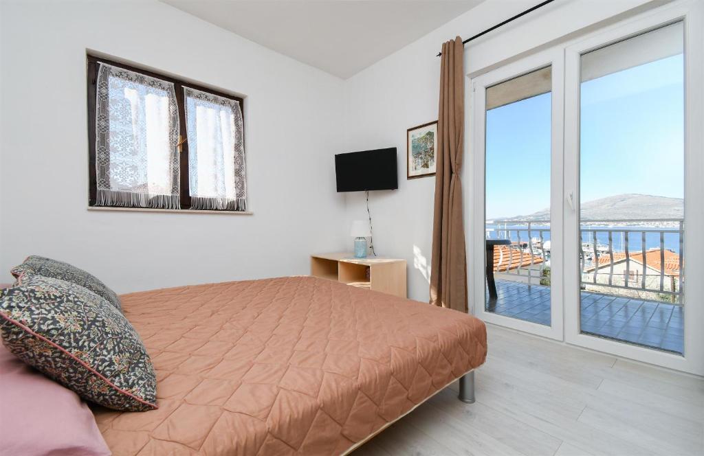 Posteľ alebo postele v izbe v ubytovaní Apartment Biserka