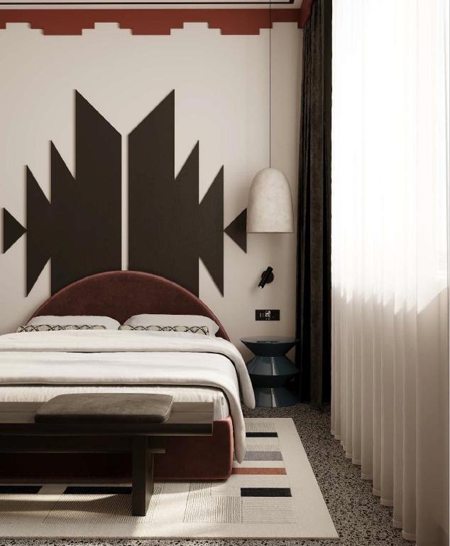 Postel nebo postele na pokoji v ubytování Bazaar Hotel