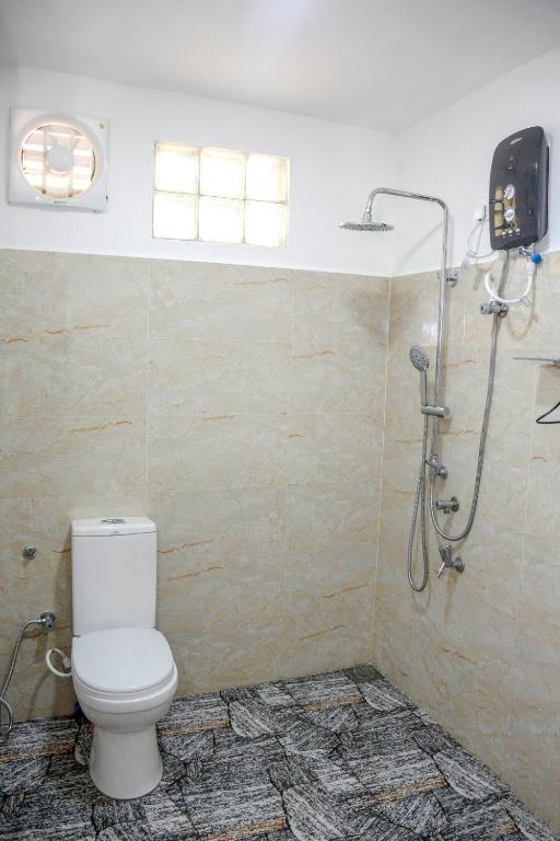 Koupelna v ubytování Tedro home stay