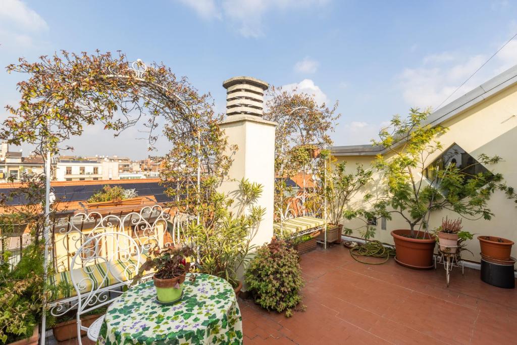 Hostmate - Milano - Design anni 50 terrazza botanica