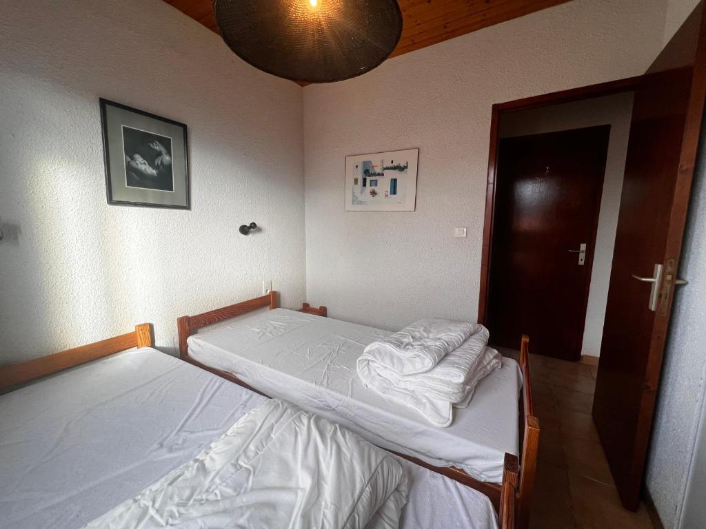 Postel nebo postele na pokoji v ubytování Domaine de l'Espinet
