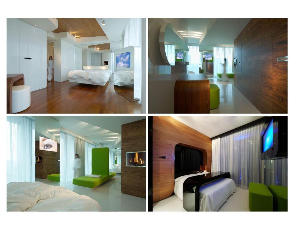 Postel nebo postele na pokoji v ubytování i-Suite Hotel