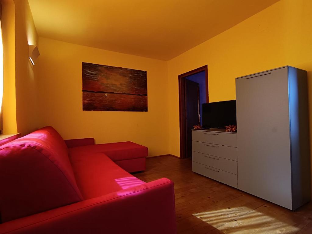 Televízia a/alebo spoločenská miestnosť v ubytovaní Moratto's Apartments