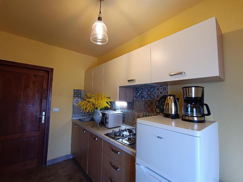 Kuchyňa alebo kuchynka v ubytovaní Moratto's Apartments