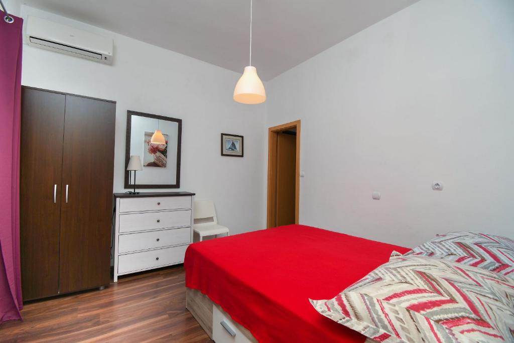 Posteľ alebo postele v izbe v ubytovaní Apartment Biserka
