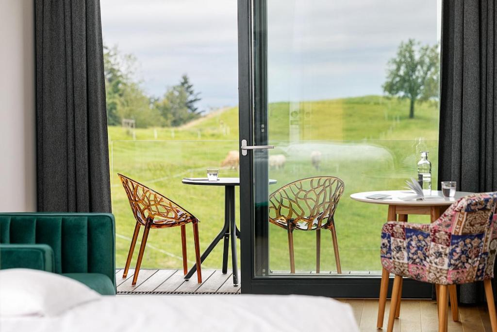 Fotografie z fotogalerie ubytování Design-Chalet mit Teilseeblick, Pool, Spa & Restaurant v destinaci Lochau