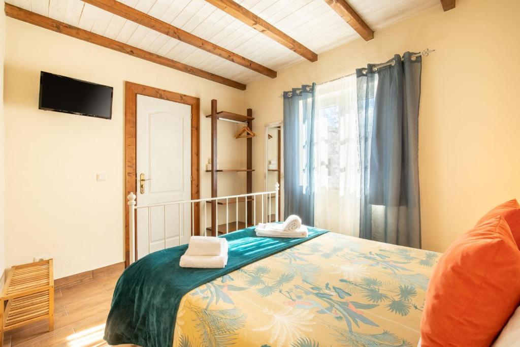 Vuode tai vuoteita majoituspaikassa Casinha D'Avó Guesthouse