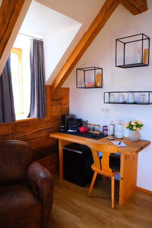 Posezení v ubytování Gmundnerberghaus - ROOMS