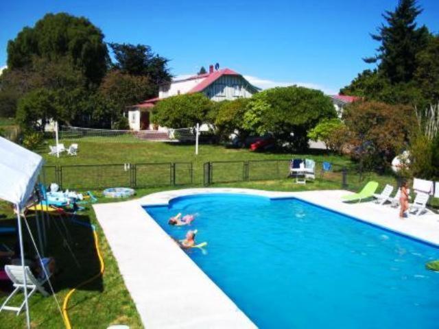 בריכת השחייה שנמצאת ב-Laguneclub - Su casa de campo או באזור