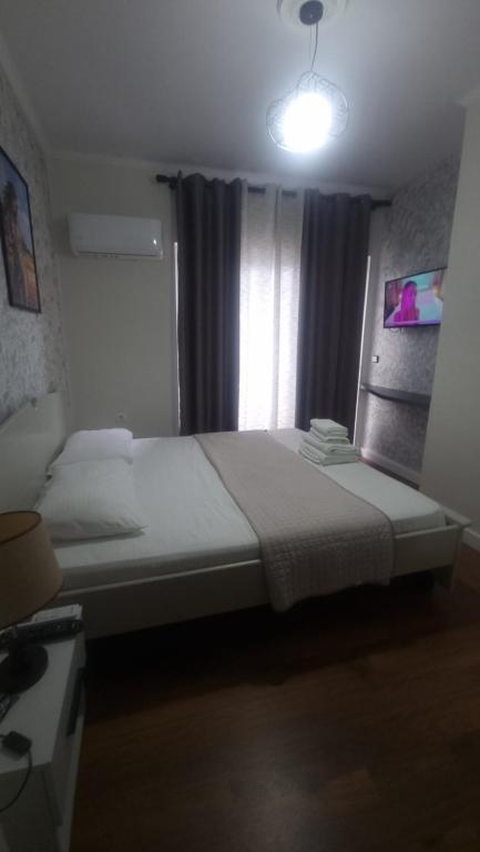 Postel nebo postele na pokoji v ubytování Hotel Klironomi