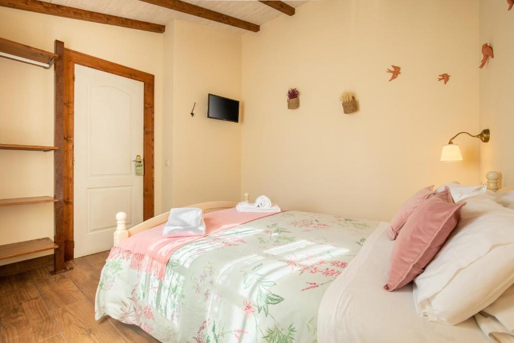 Vuode tai vuoteita majoituspaikassa Casinha D'Avó Guesthouse