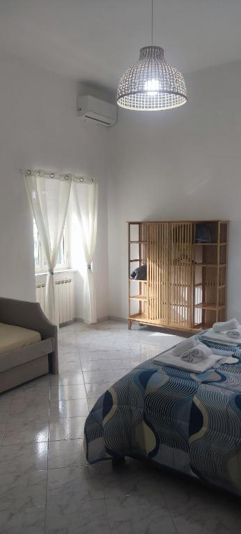 A bed or beds in a room at Il Cortile