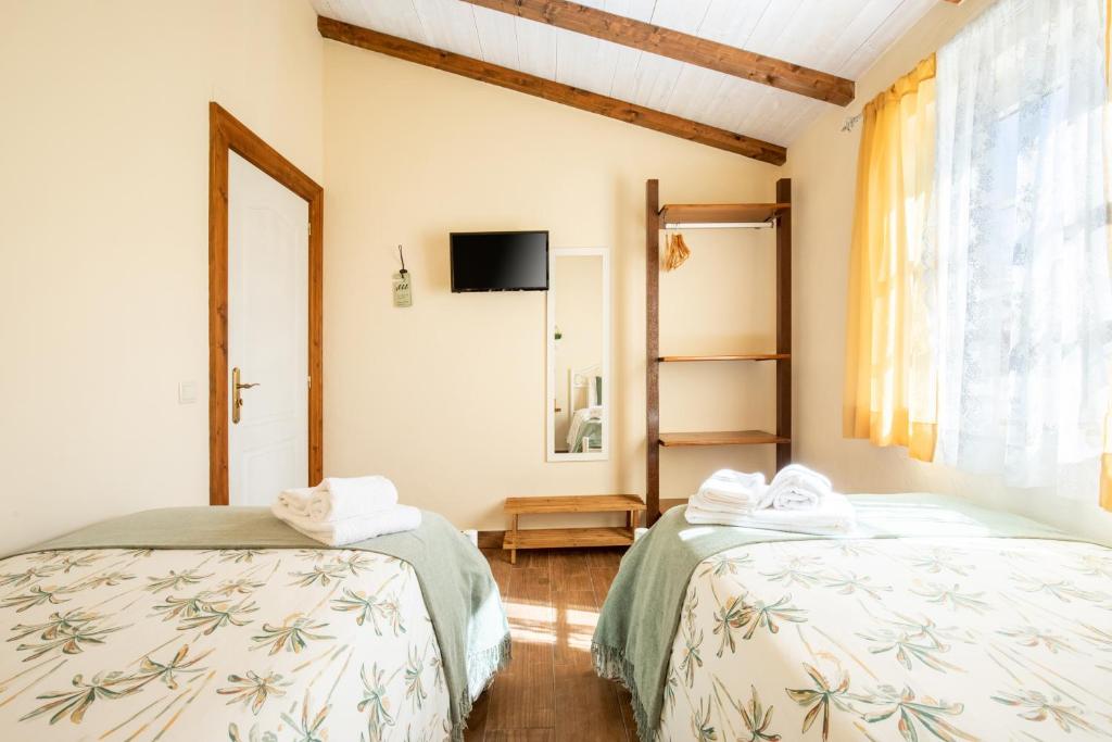 Vuode tai vuoteita majoituspaikassa Casinha D'Avó Guesthouse