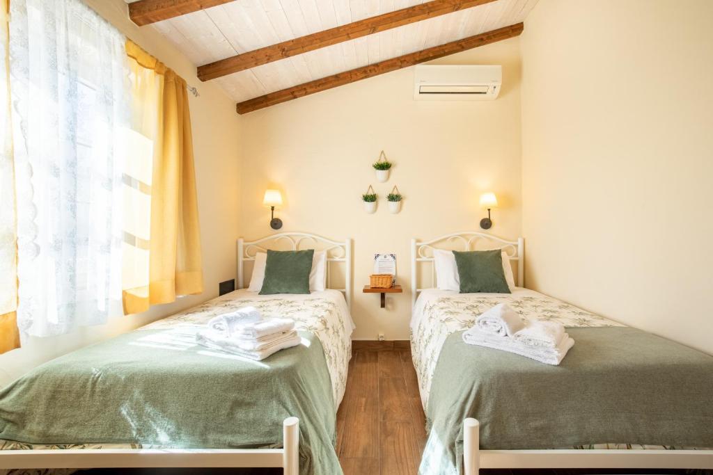 Vuode tai vuoteita majoituspaikassa Casinha D'Avó Guesthouse
