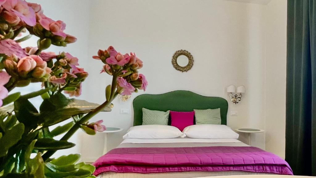 Postel nebo postele na pokoji v ubytování Castelfiore