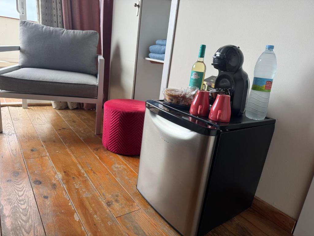 Część wypoczynkowa w obiekcie Duplex de lujo en la playa , jacuzzy, piscina, chimenea y padel