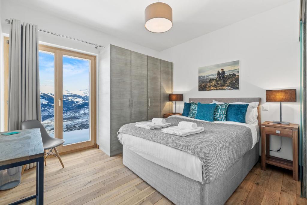 Postel nebo postele na pokoji v ubytování Chalet Ibex, à côté de la piste de Veysonnaz