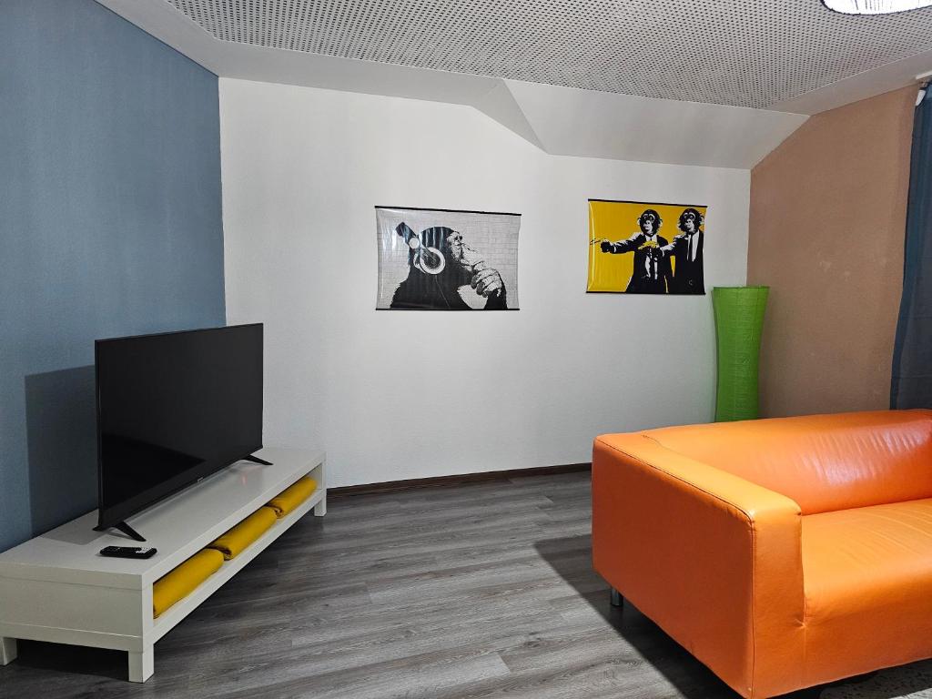 TV a/nebo společenská místnost v ubytování Sleep here