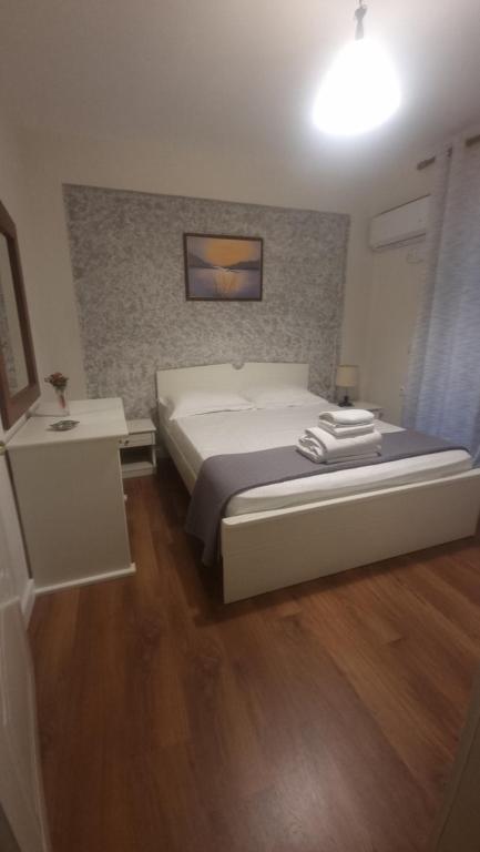Postel nebo postele na pokoji v ubytování Hotel Klironomi