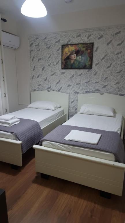 Postel nebo postele na pokoji v ubytování Hotel Klironomi