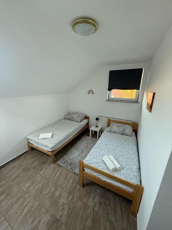 En eller flere senger på et rom på Sobe Ježdovec