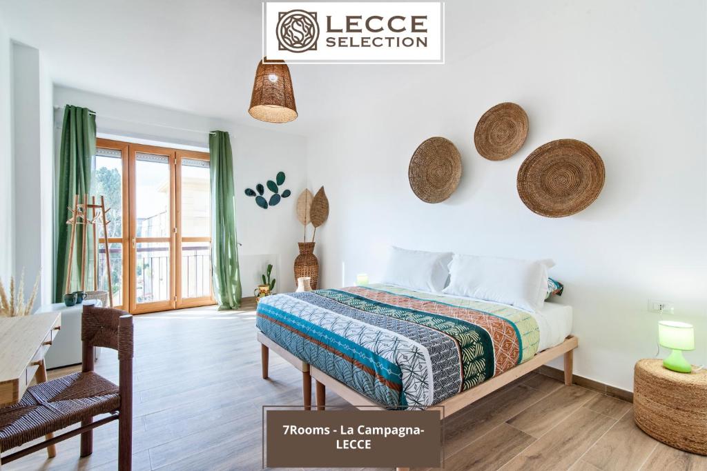 Postel nebo postele na pokoji v ubytování 7Rooms - Lecce Selection