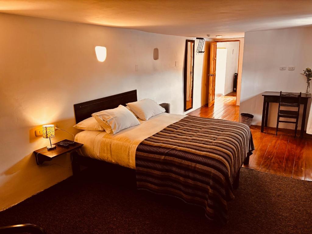 Postel nebo postele na pokoji v ubytování SAMANA B&B
