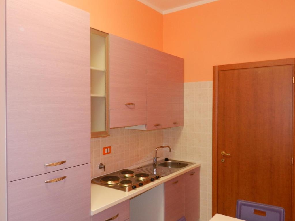 A kitchen or kitchenette at Appartamenti Valdocco