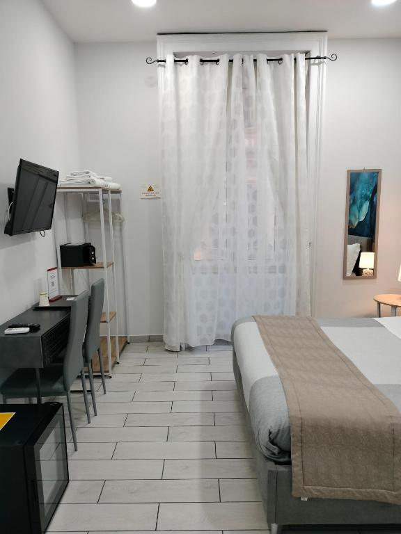 Posteľ alebo postele v izbe v ubytovaní B&B Marcello&Core
