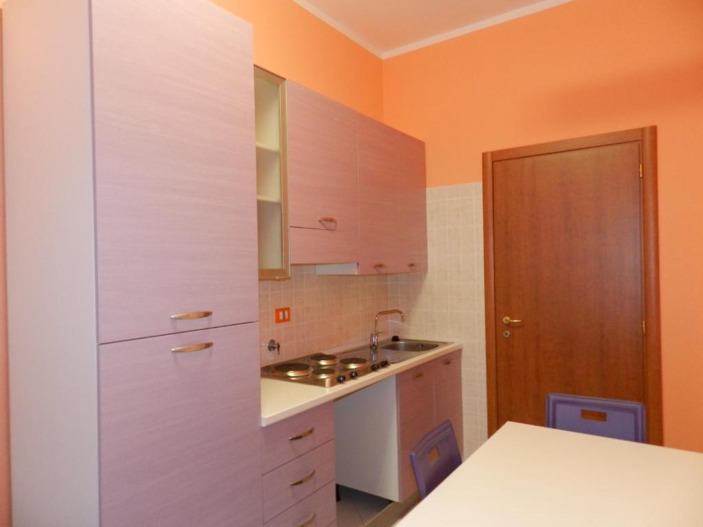 A kitchen or kitchenette at Appartamenti Valdocco