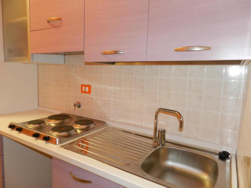 A kitchen or kitchenette at Appartamenti Valdocco
