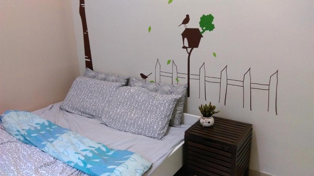 Letto o letti in una camera di YHA Ngong Ping SG Davis Youth Hostel