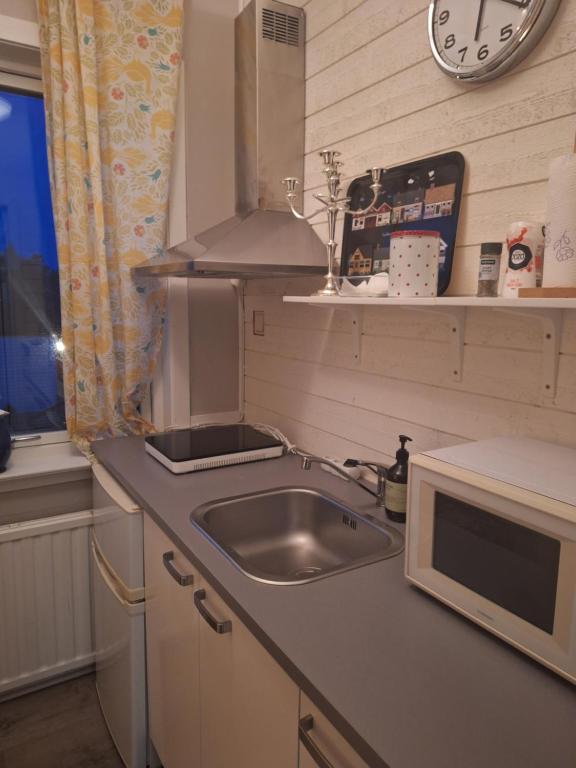 Kuchyň nebo kuchyňský kout v ubytování Båstad Stationsterrassen 9