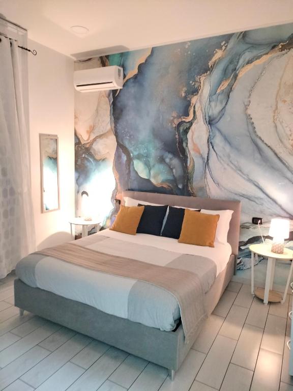 Posteľ alebo postele v izbe v ubytovaní B&B Marcello&Core