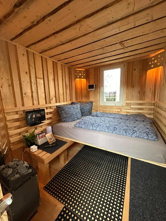 Postel nebo postele na pokoji v ubytování Röhrencamp Schöten/Apolda