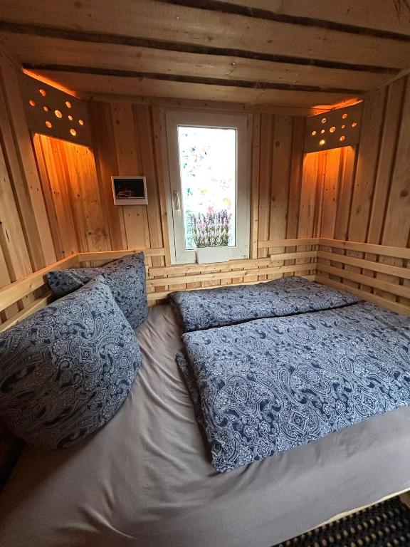 Postel nebo postele na pokoji v ubytování Röhrencamp Schöten/Apolda