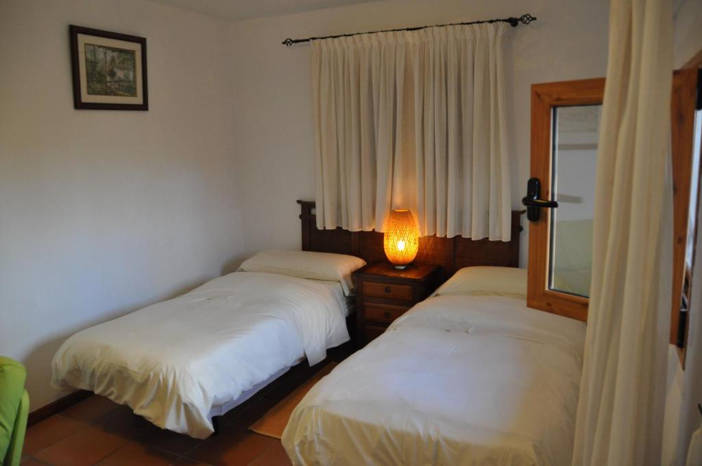 Postel nebo postele na pokoji v ubytování Finca Hacienda Mit Eigenem Schwimmbad