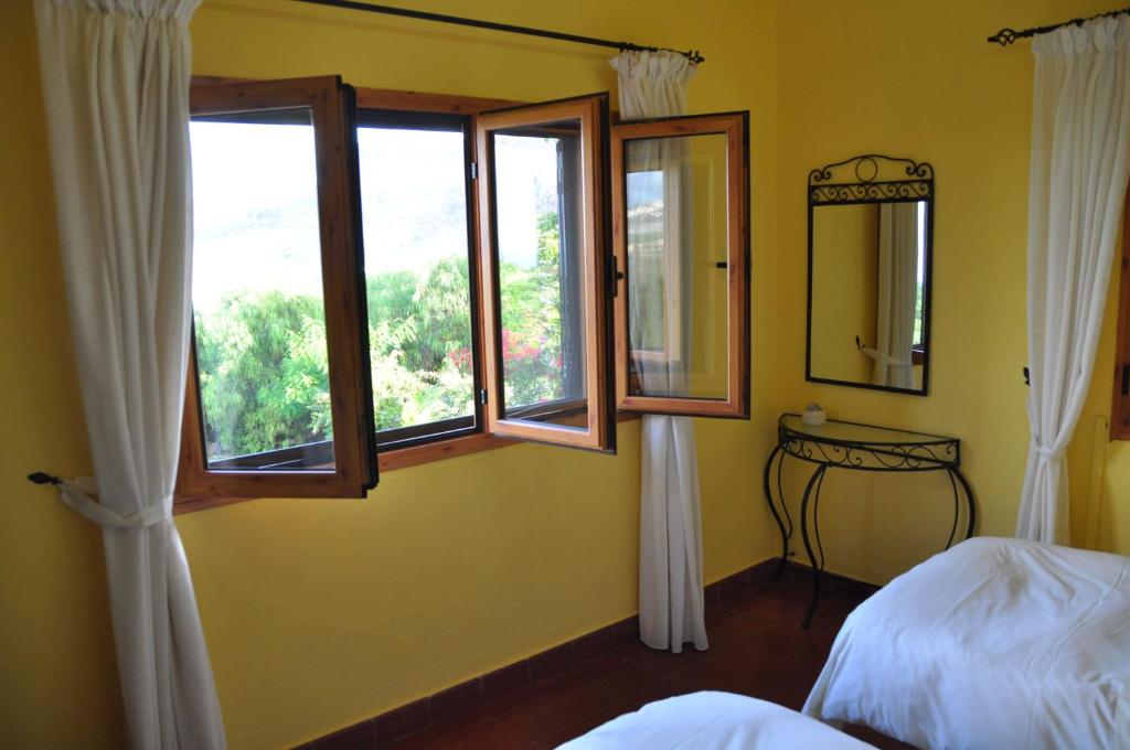 Postel nebo postele na pokoji v ubytování Finca Hacienda Mit Eigenem Schwimmbad