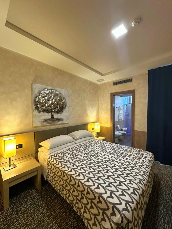 Postel nebo postele na pokoji v ubytování Domus Park Hotel & SPA