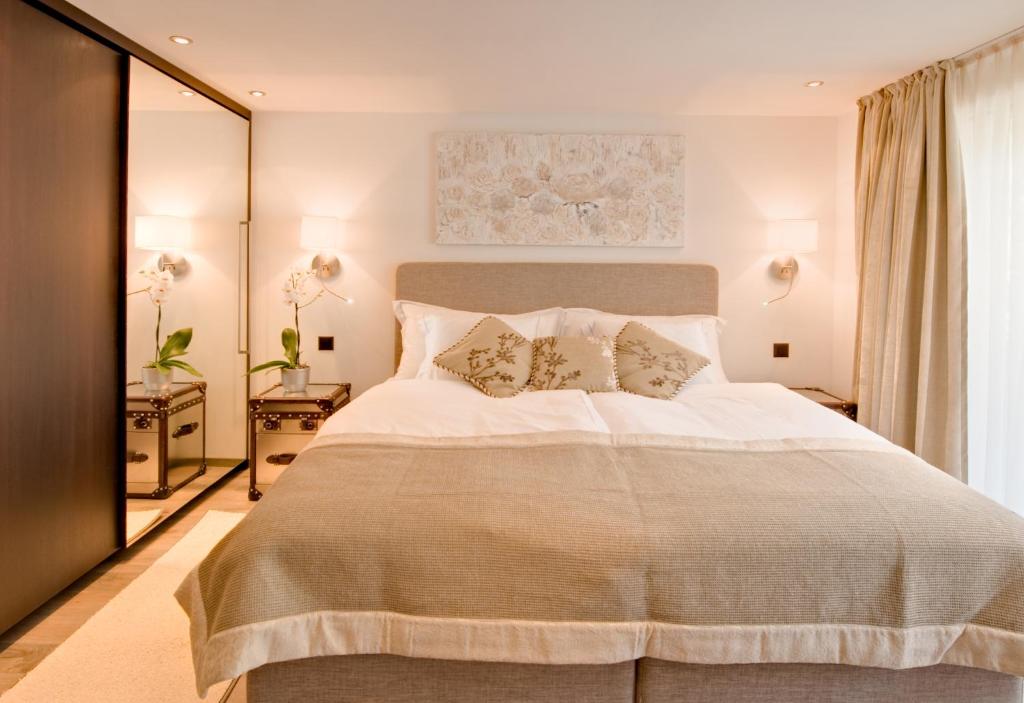 Ένα ή περισσότερα κρεβάτια σε δωμάτιο στο Alex Lodge Private Luxury Apartments