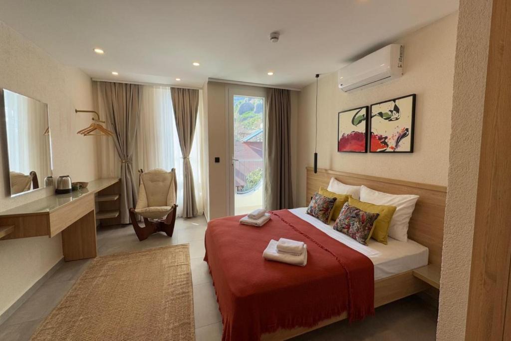 Postel nebo postele na pokoji v ubytování Uva Rooms