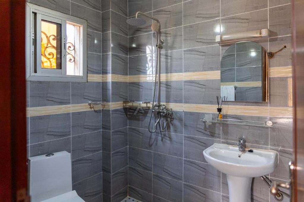 Koupelna v ubytování High-end 2BR apartment in the heart of Yaoundé