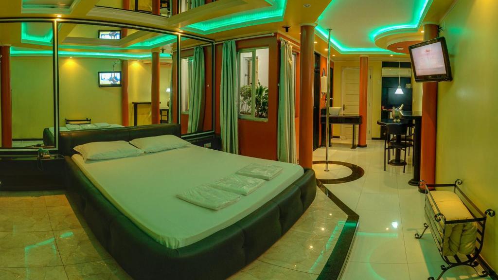 TV a/nebo společenská místnost v ubytování Motel Aquarius (Adults Only)