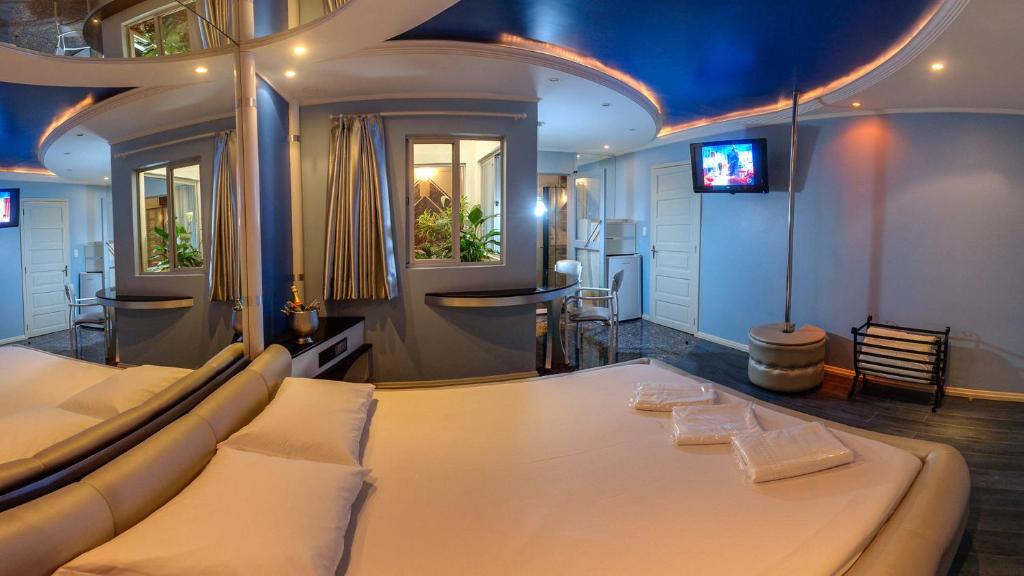 TV a/nebo společenská místnost v ubytování Motel Aquarius (Adults Only)