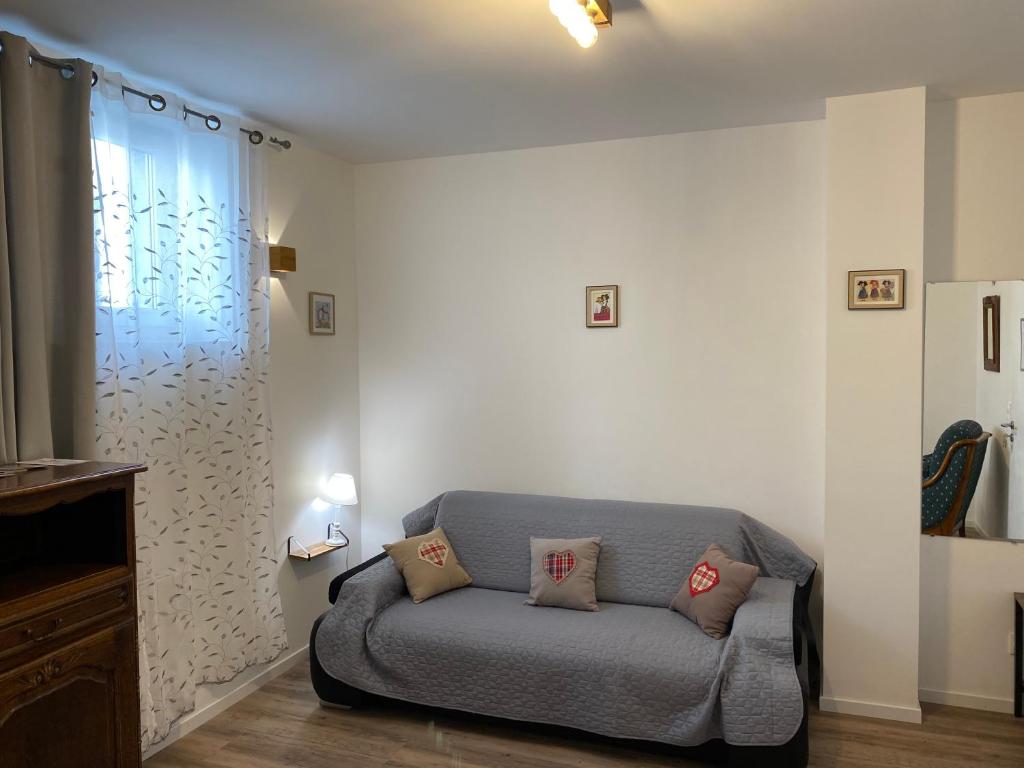Posezení v ubytování Au repos des vignes, chambres d'hôtes